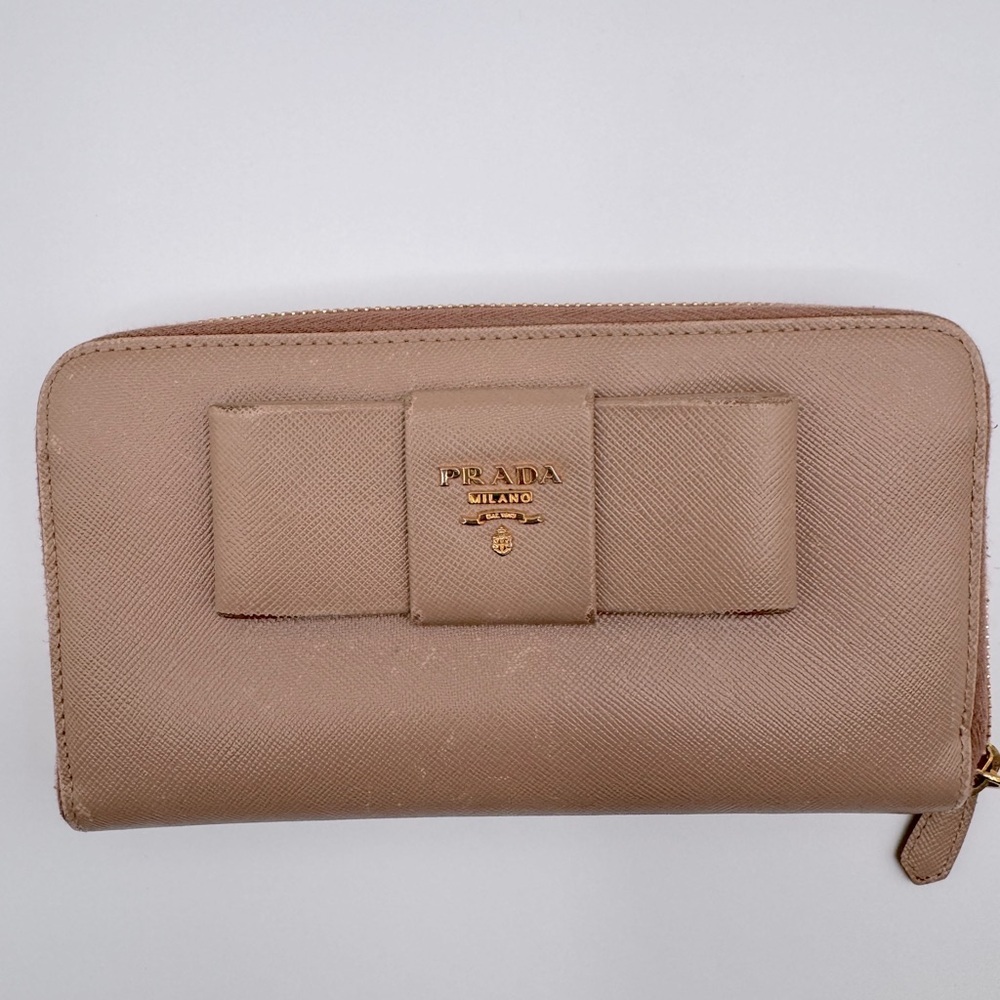 Prada Bow Zip Around Wallet in Beige